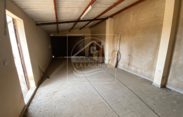 SALY : Beau terrain à vendre clôturé de 611m2 avec garage à 600m de la mer