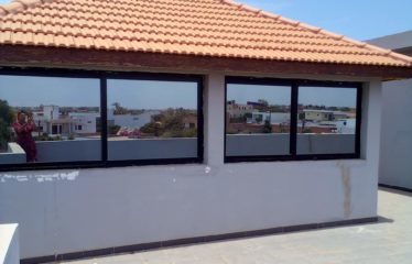 NGAPAROU : Bâtisse originale de 6 chambres à vendre