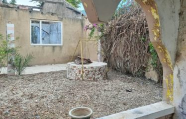 SALY : Terrain de 1000 m² avec villa à démolir